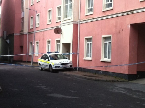 Gardai seal off the apartment where the body was found at Lower Main Street.