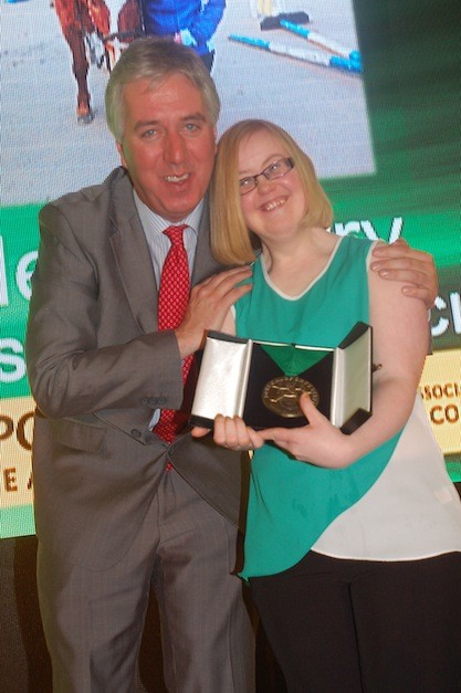 Eileen Ferry receives her award from John Delaney