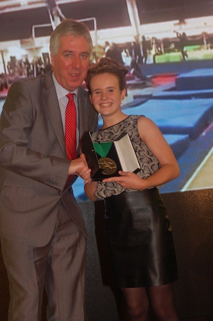 A delighted Megan Lynch picks up the gymnastics award.