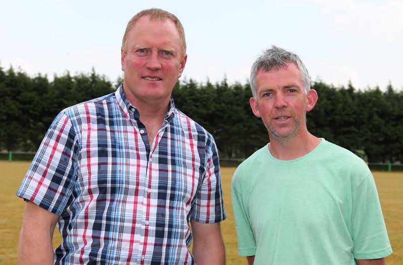 William Coyle of Pitch Dimensions and Eunan Doherty discuss the laying of the new playing surface at Diamond Park, Ballyare. Pic.: Gary Foy, League PRO